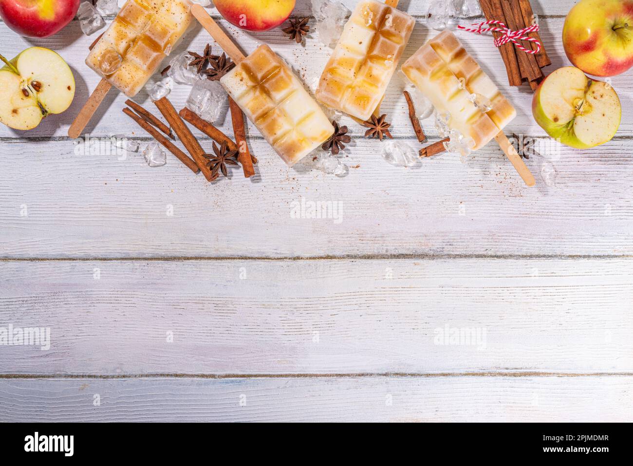 Apple pie ice cream popsicles on a stick. Homemade lollipops with apple pie spicy flavor, on