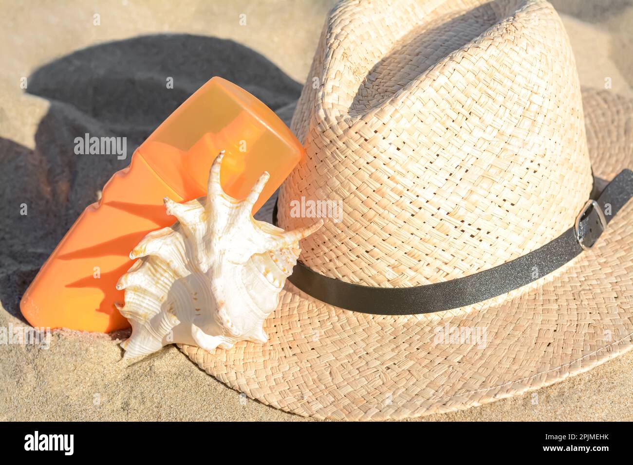 Stylish straw hat bottle hi-res stock photography and images - Alamy