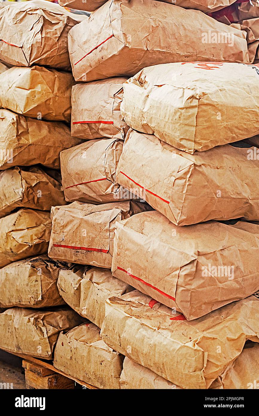 build materials stacked in craft bags. vertical Stock Photo