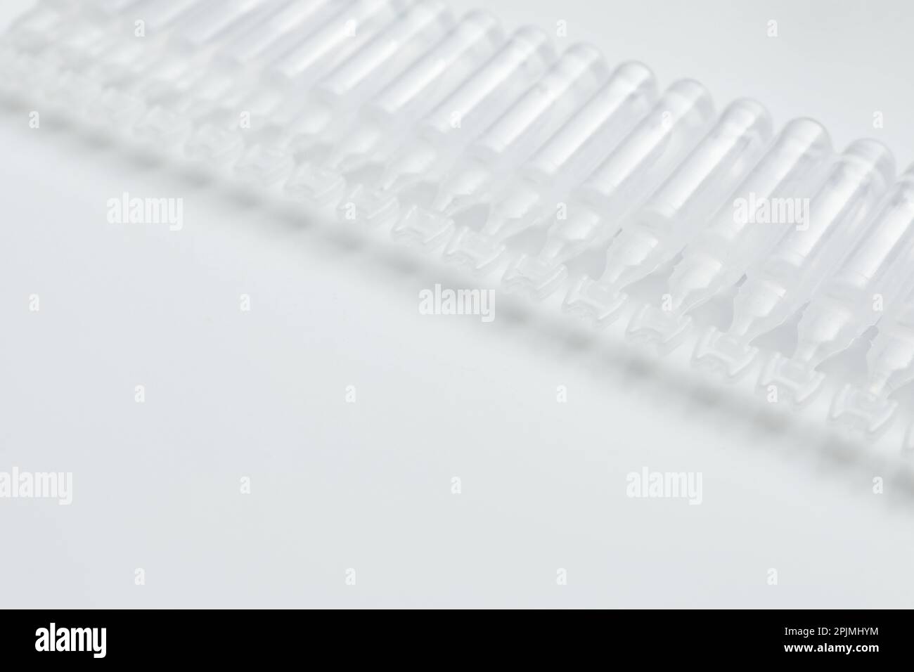 Single dose ampoules of sterile isotonic sea water solution on white