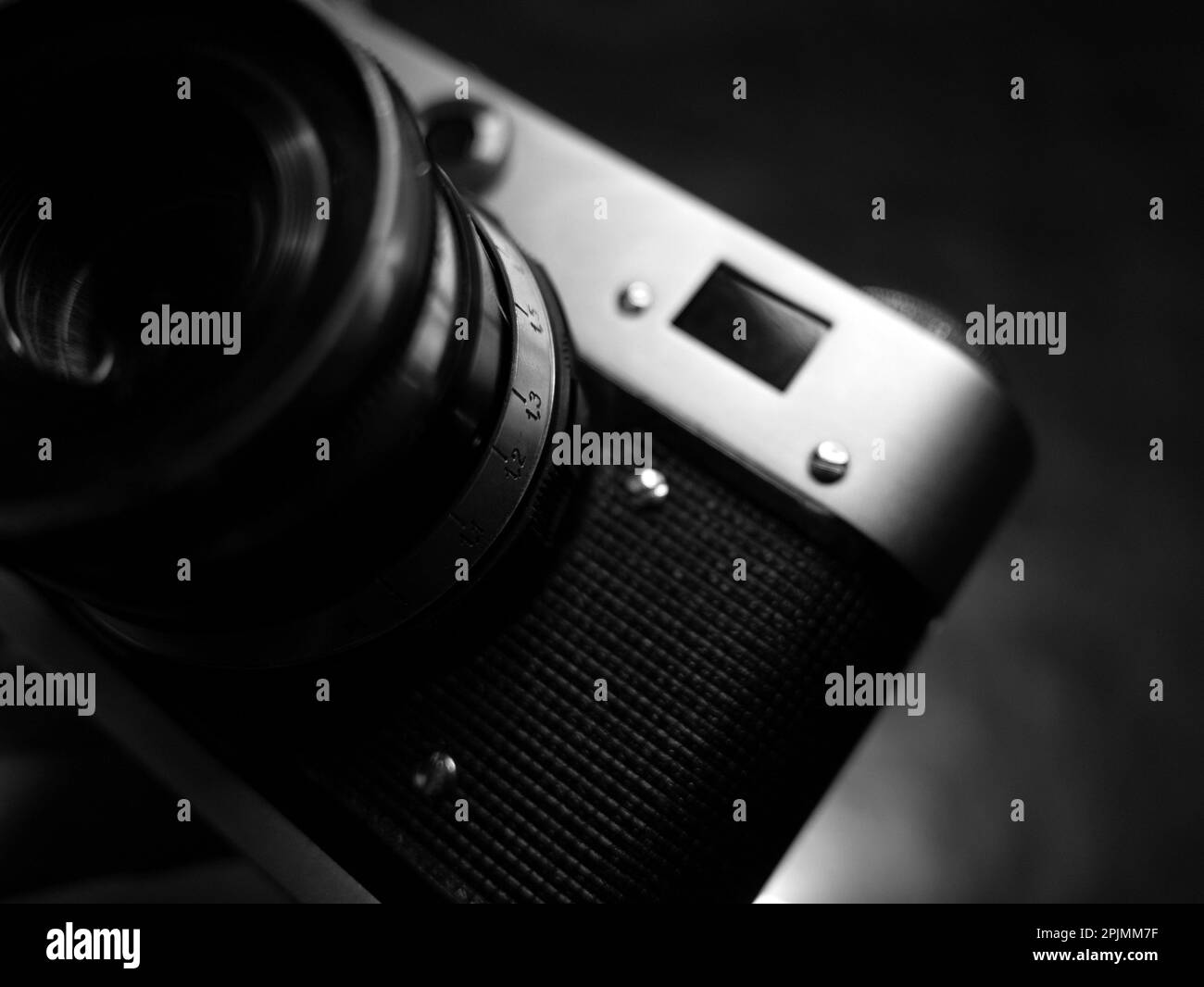 A grayscale shot of the small parts of an old vintage camera Stock
