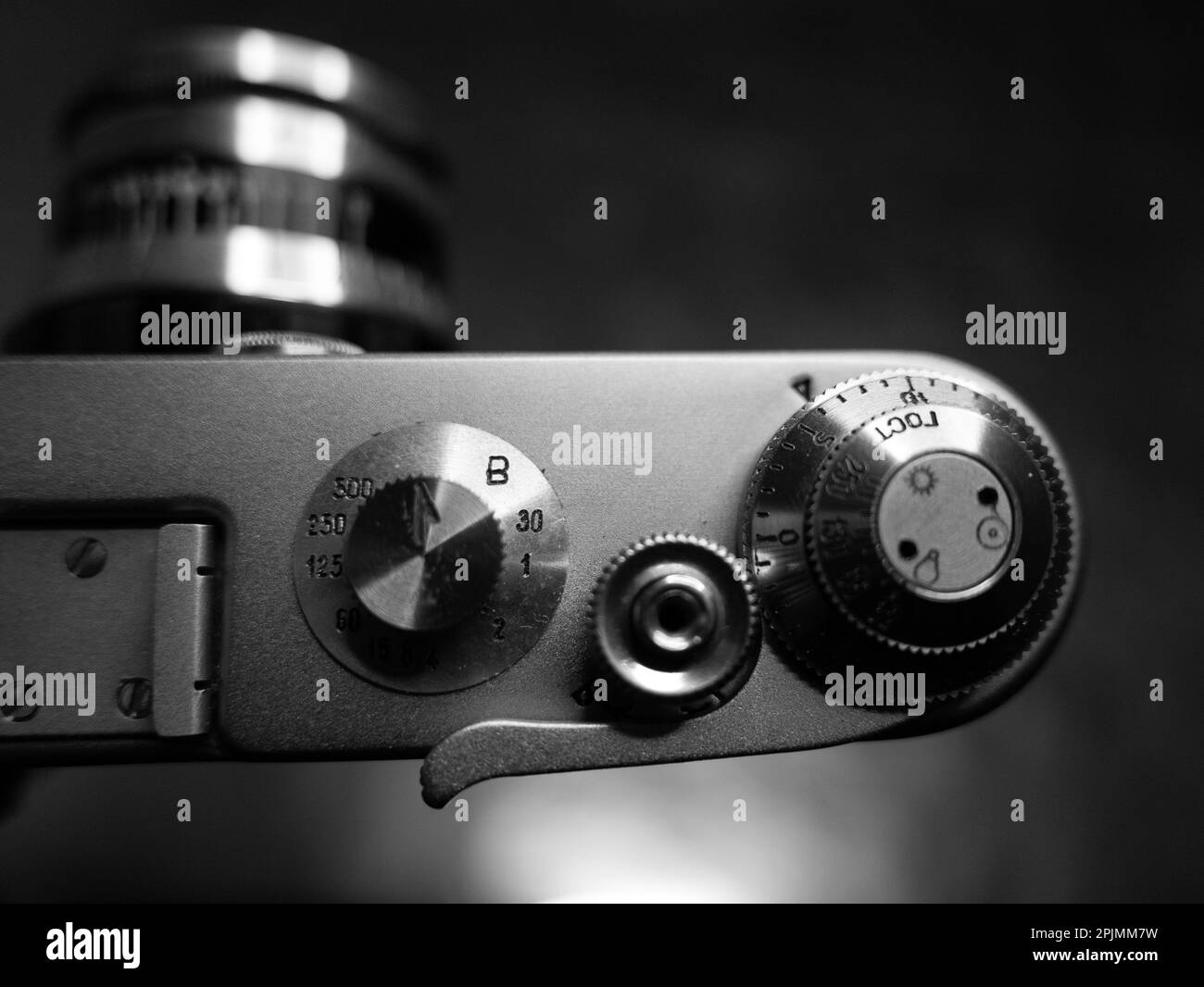 A grayscale shot of the small parts of an old vintage camera Stock