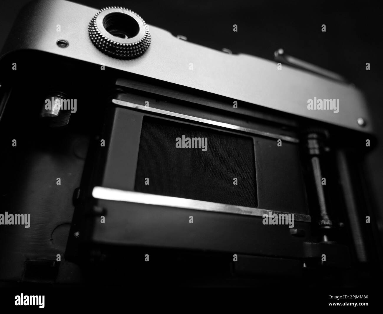 A grayscale shot of the small parts of an old vintage camera Stock