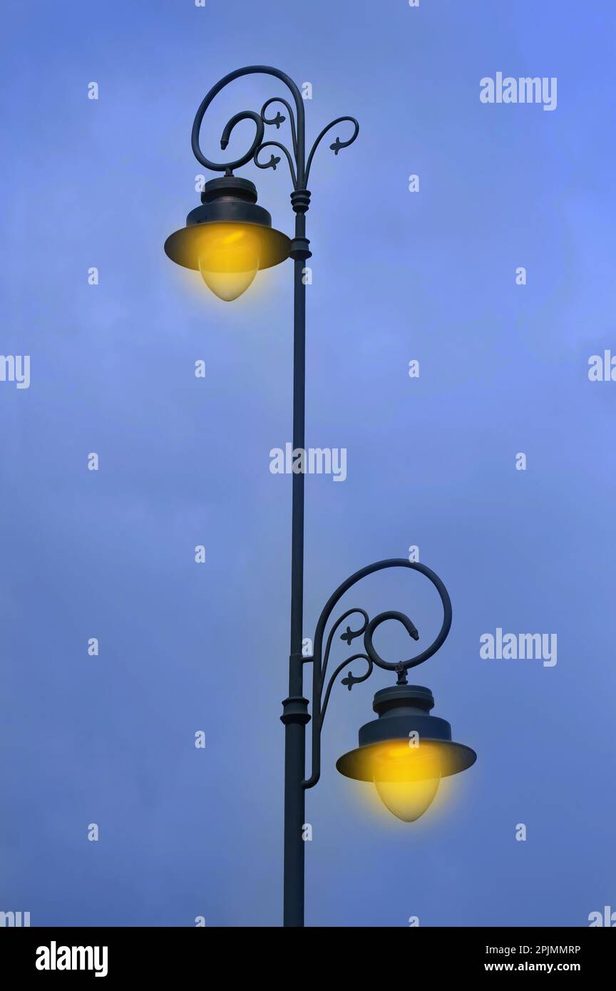 Beautiful old fashioned street lamps lighting outdoors Stock Photo Alamy