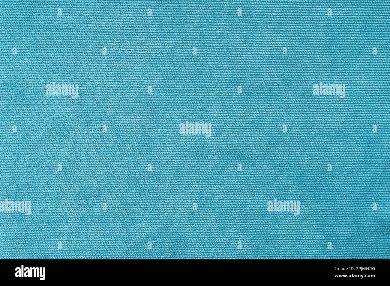 Texture background of velours turquoise fabric. Upholstery velveteen texture fabric, corduroy furniture textile material, design interior, decor. Ridg Stock Photo