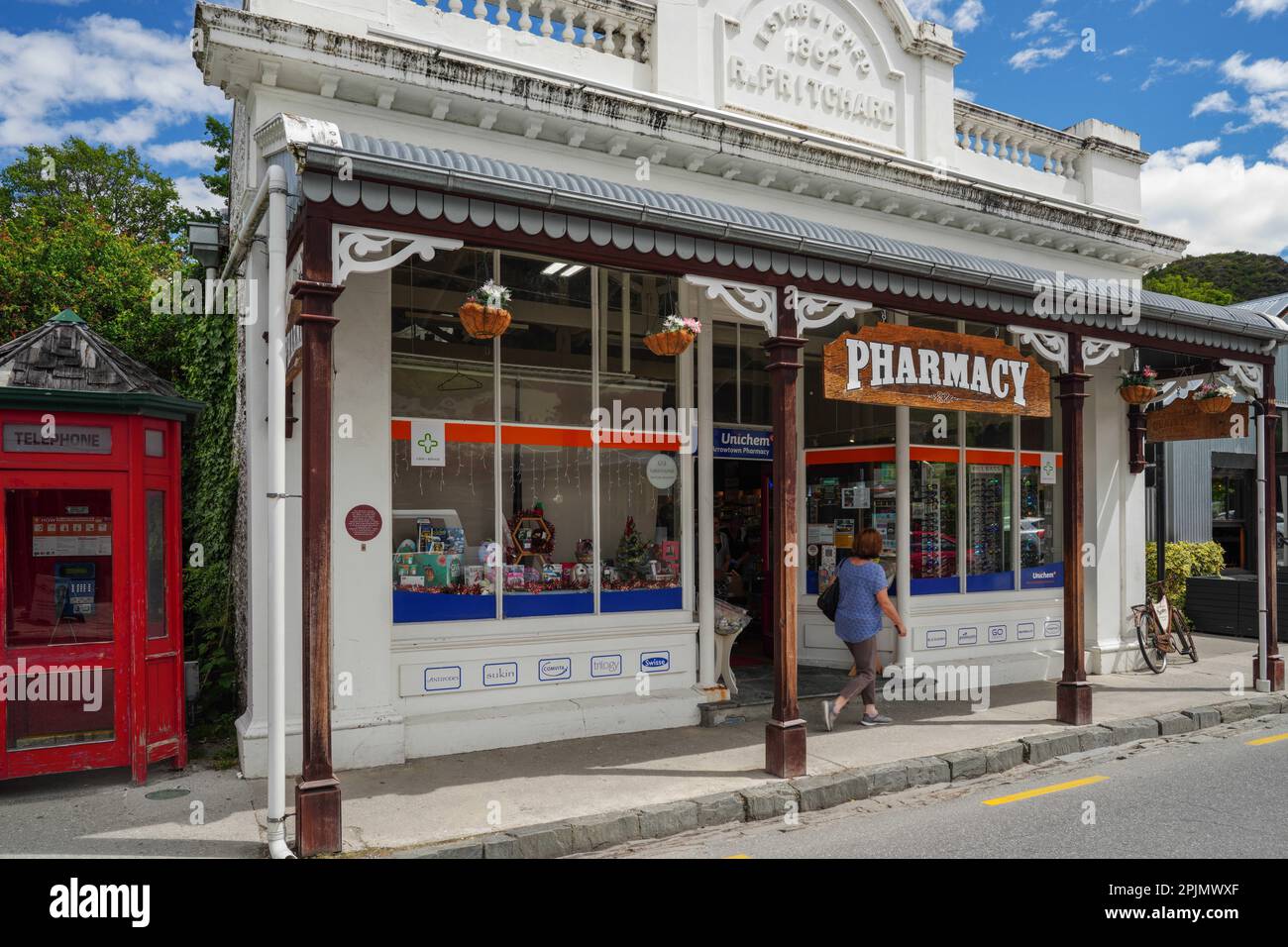This is Arrowtown in New Zealand on the South Island. They have kept and renovated many old buildings like this pharmacy attracting tourists. Stock Photo