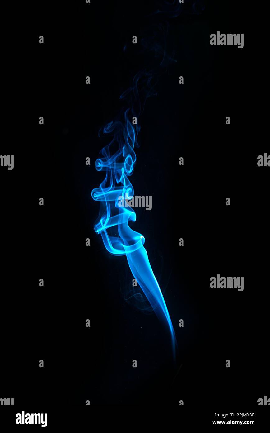 swirl of blue smoke isolated on black background Stock Photo Alamy