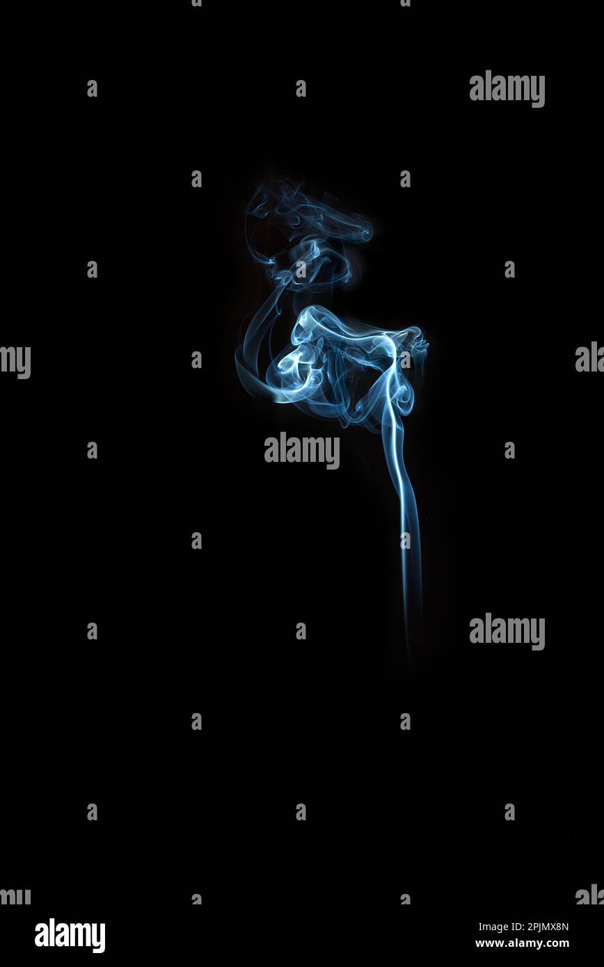 swirl of blue smoke isolated on black background Stock Photo - Alamy