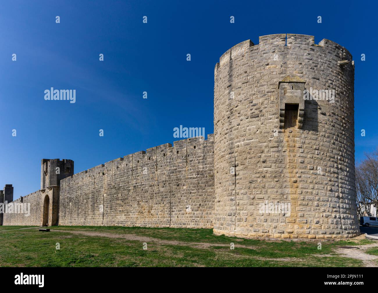 A view of the historic city walls surrounding the Camargue village of Aigues-Mortes Stock Photo