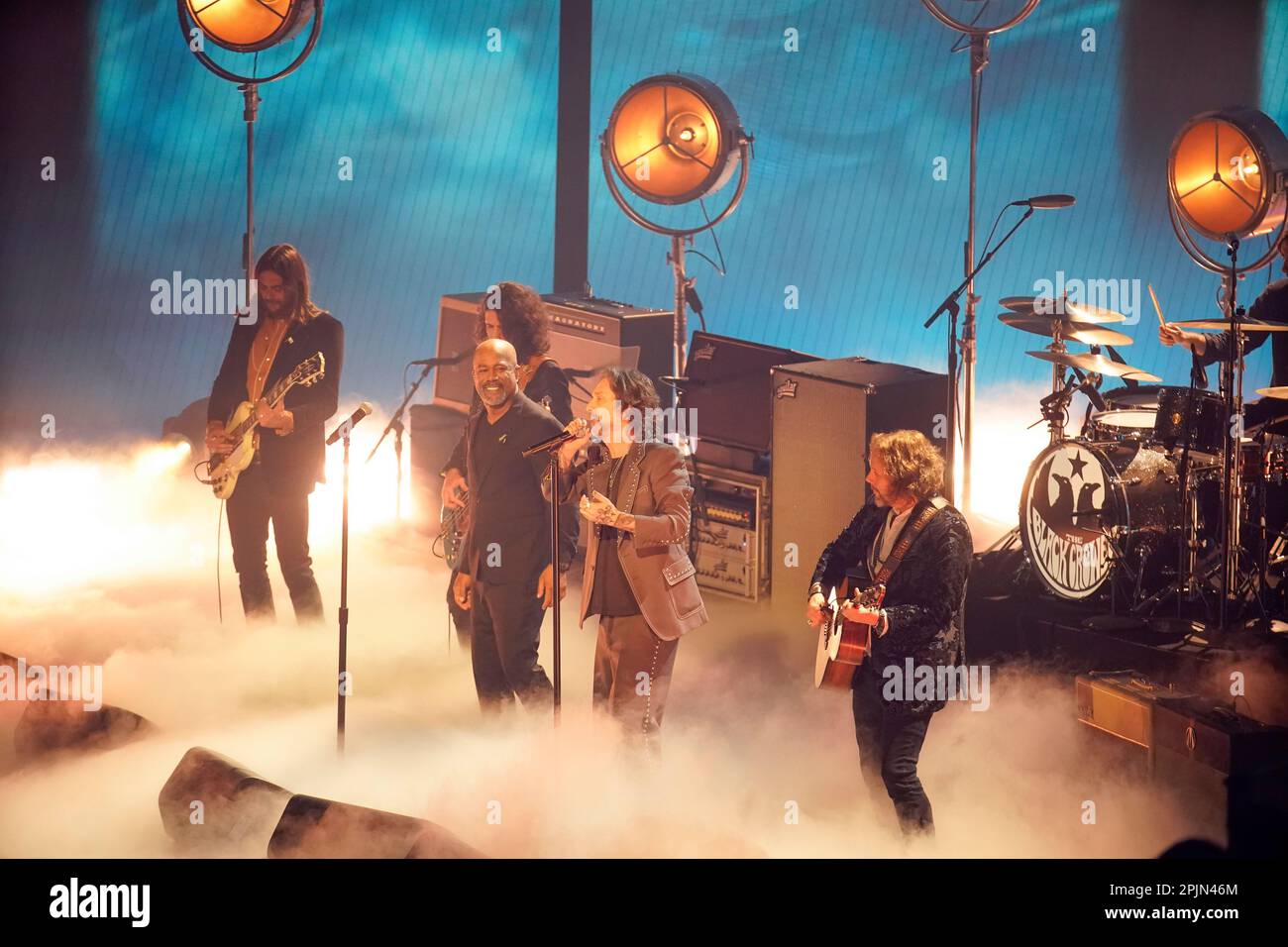 Country singer DARIUS RUCKER with CHRIS ROBINSON and the Black Crowes rock band onstage at the 2023 Country Music Television (CMT) Music Awards held for the first time in Austin, Texas on April 2, 2023 at the Moody Center before a sold out crowd. Credit: Bob Daemmrich/Alamy Live News Stock Photo