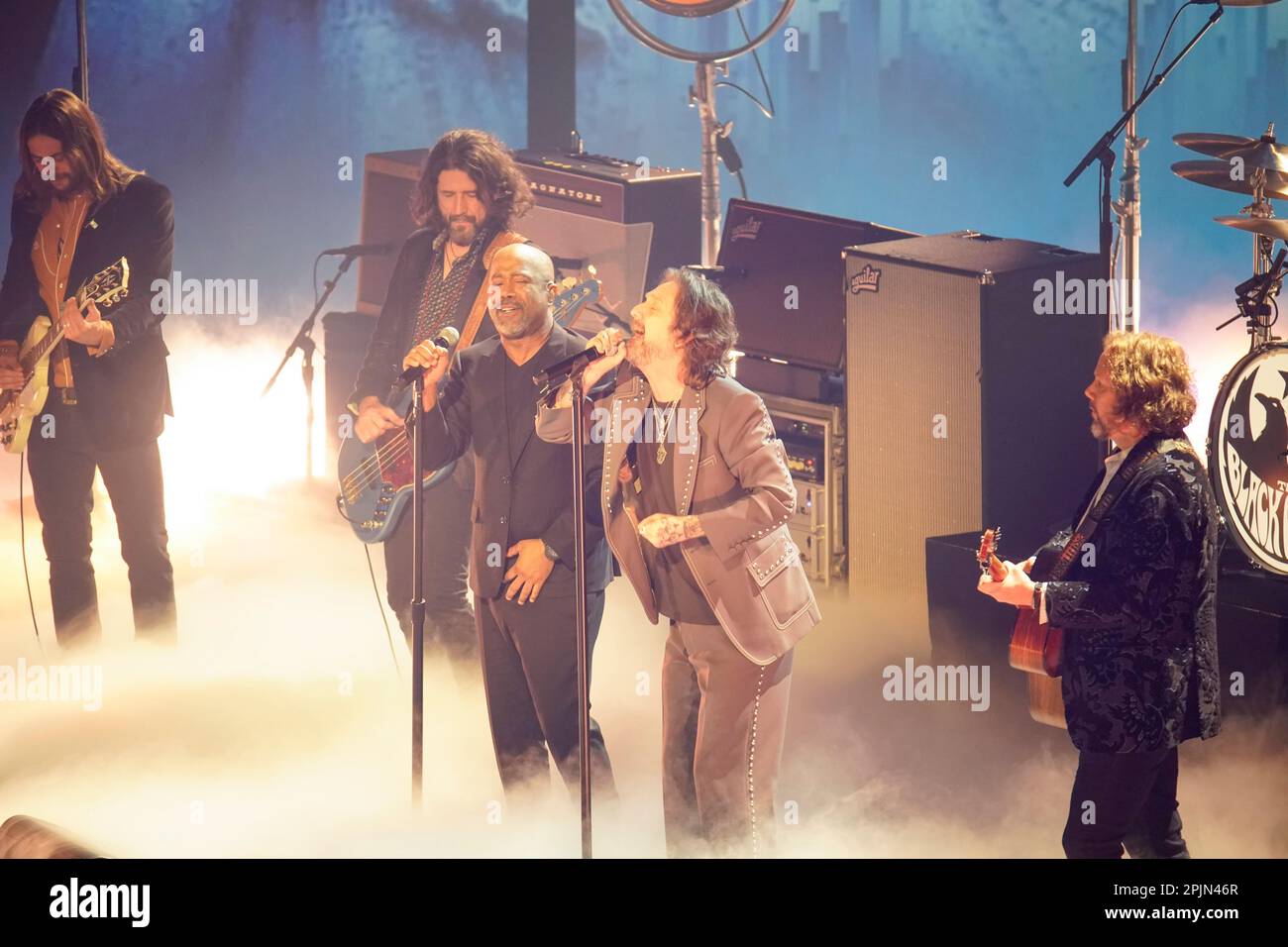 Country singer DARIUS RUCKER with CHRIS ROBINSON and the Black Crowes rock band onstage at the 2023 Country Music Television (CMT) Music Awards held for the first time in Austin, Texas on April 2, 2023 at the Moody Center before a sold out crowd. Credit: Bob Daemmrich/Alamy Live News Stock Photo