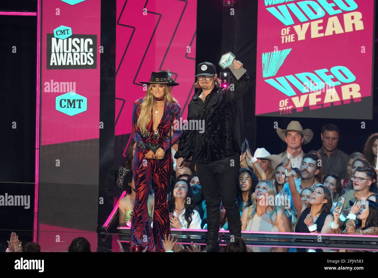 Presenter and singers LAINEY WILSON and HARDY receive an award onstage at the 2023 Country Music Television (CMT) Music Awards held for the first time in Austin, Texas on April 2, 2023 at the Moody Center before a sold out crowd. Credit: Bob Daemmrich/Alamy Live News Stock Photo