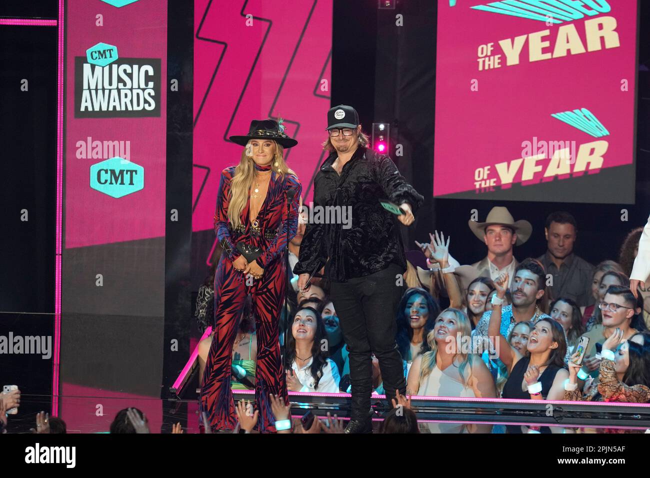 Presenter and singers LAINEY WILSON and HARDY receive an award onstage at the 2023 Country Music Television (CMT) Music Awards held for the first time in Austin, Texas on April 2, 2023 at the Moody Center before a sold out crowd. Credit: Bob Daemmrich/Alamy Live News Stock Photo