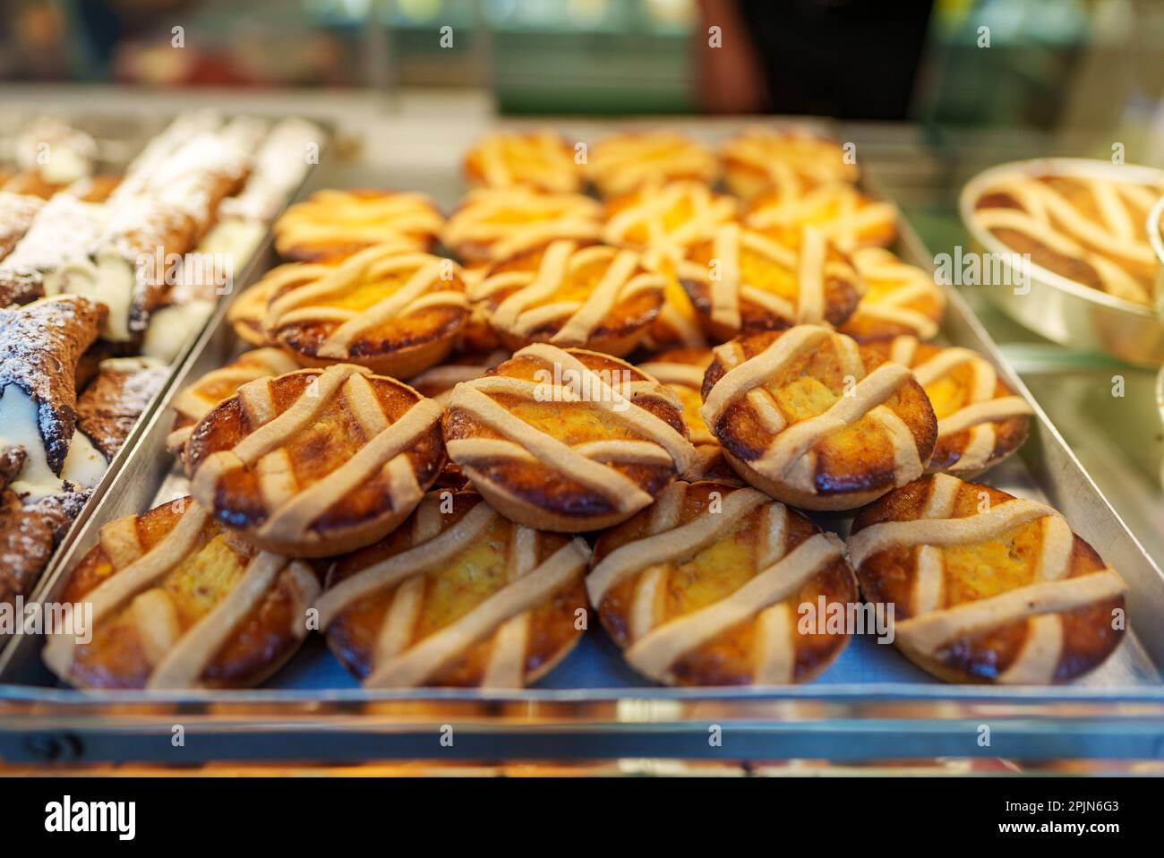 Fresh pastries on display in the store Stock Photo Alamy