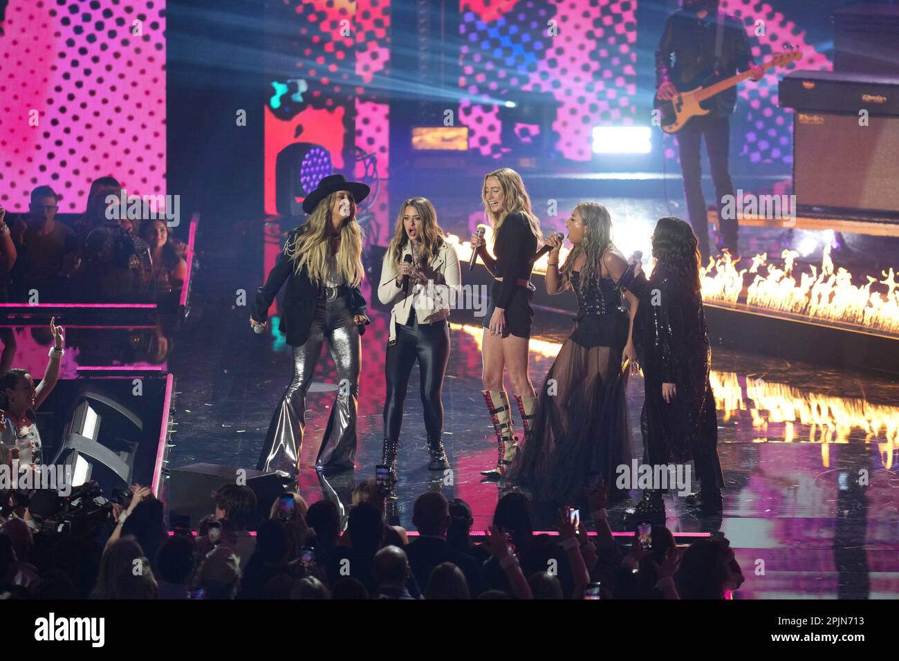 Singers LAINEY WILSON, MORGAN WADE, INGRID ANDRESS and MADELINE EDWARDS appear along with ALANIS MORISETTE (far right) to celebrate the 'Next Women of Country' 10th anniversary onstage at the 2023 Country Music Television (CMT) Music Awards held for the first time in Austin, Texas on April 2, 2023 at the Moody Center before a sold out crowd. Credit: Bob Daemmrich/Alamy Live News Stock Photo