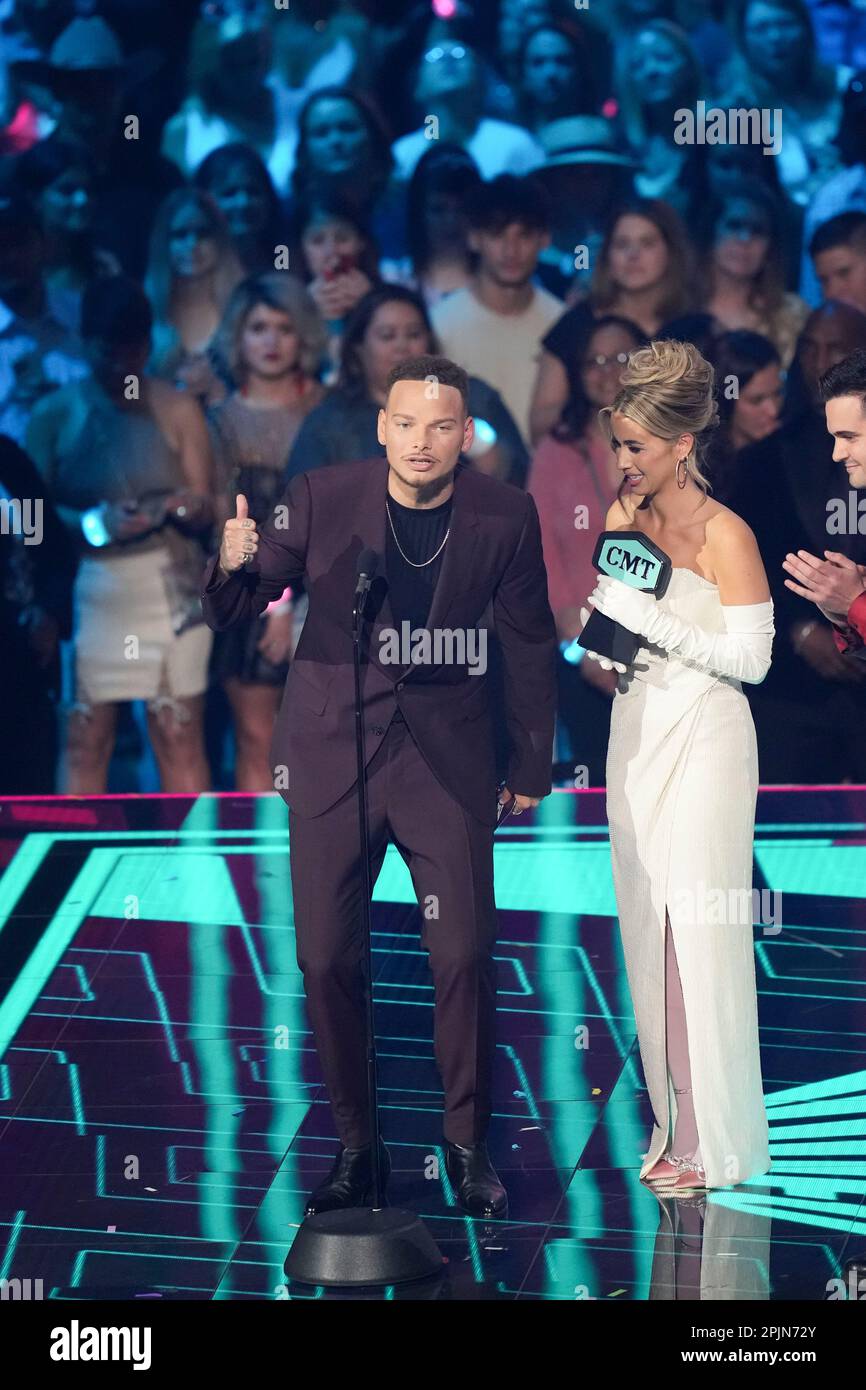 Award winners singers KANE BROWN (l) and wife KAITLYN BROWN onstage at the 2023 Country Music Television (CMT) Music Awards held for the first time in Austin, Texas on April 2, 2023 at the Moody Center before a sold out crowd. Credit: Bob Daemmrich/Alamy Live News Stock Photo