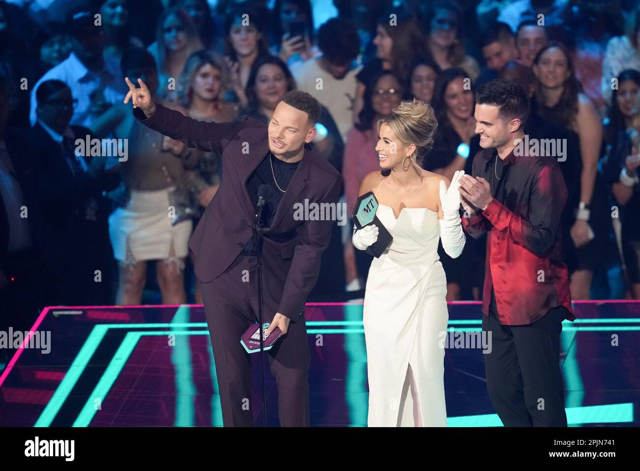 Award winners singers KANE BROWN (l) and wife KAITLYN BROWN onstage at the 2023 Country Music Television (CMT) Music Awards held for the first time in Austin, Texas on April 2, 2023 at the Moody Center before a sold out crowd. Credit: Bob Daemmrich/Alamy Live News Stock Photo