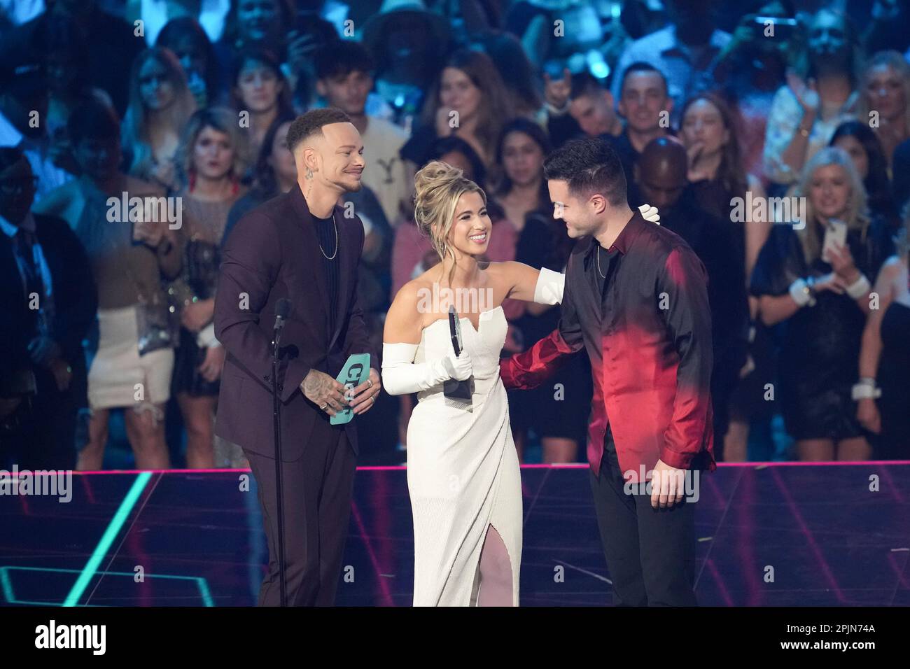 Award winners singers KANE BROWN (l) and wife KAITLYN BROWN onstage at the 2023 Country Music Television (CMT) Music Awards held for the first time in Austin, Texas on April 2, 2023 at the Moody Center before a sold out crowd. Credit: Bob Daemmrich/Alamy Live News Stock Photo