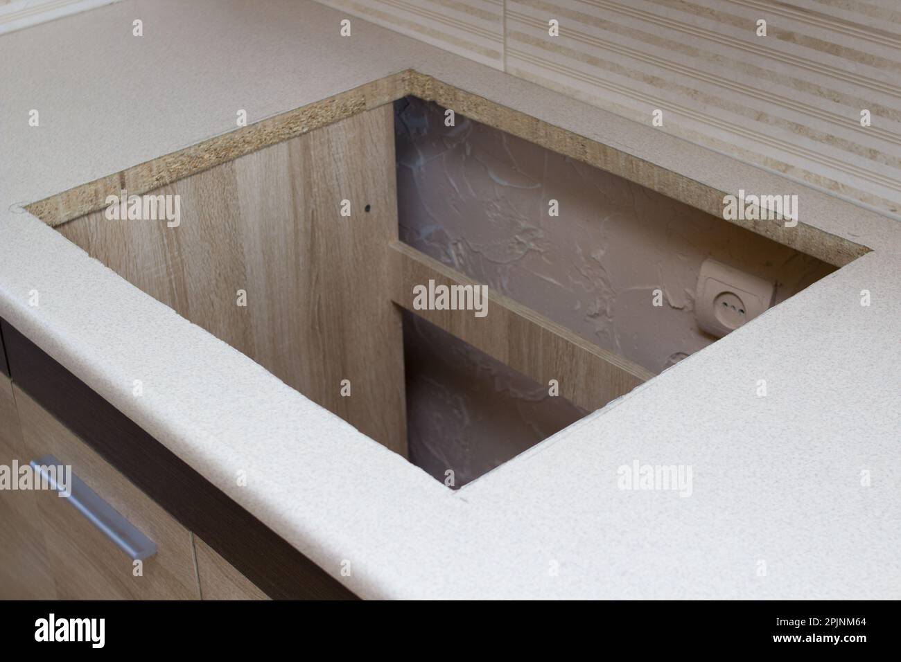 In the kitchen, the square is squarecut for installation of the