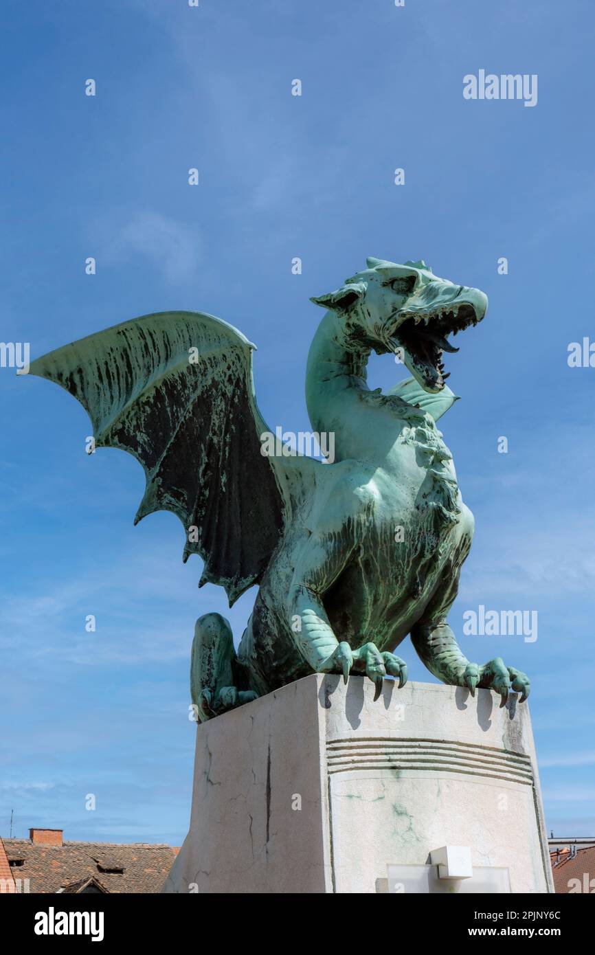 Ljubljana, Slovenia.  Bronze Dragon on the Art Nouveau Dragon Bridge.  The Ljubljana Dragon is the city symbol.  The bridge was designed by architect Stock Photo