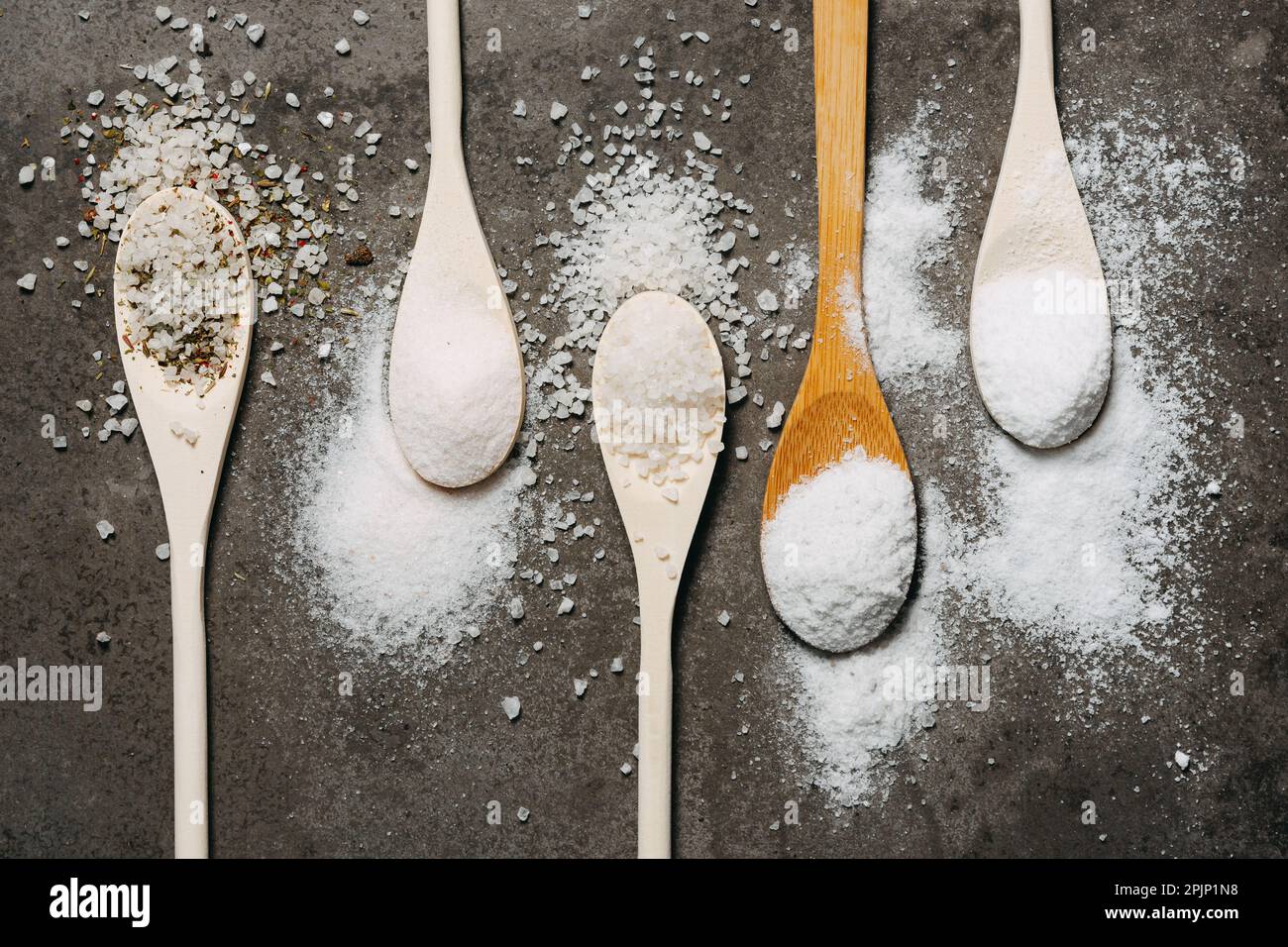 Different types of salt. Sea, himalayan and regular table salt Stock