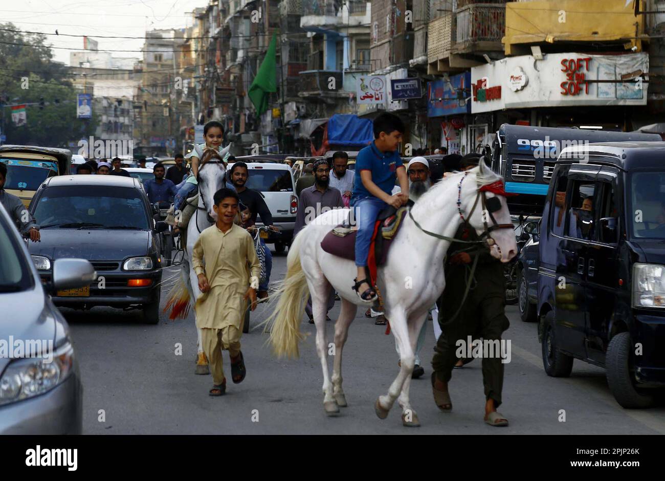 Karachi, Pakistan, April 3, 2023. Children are enjoying horse riding at