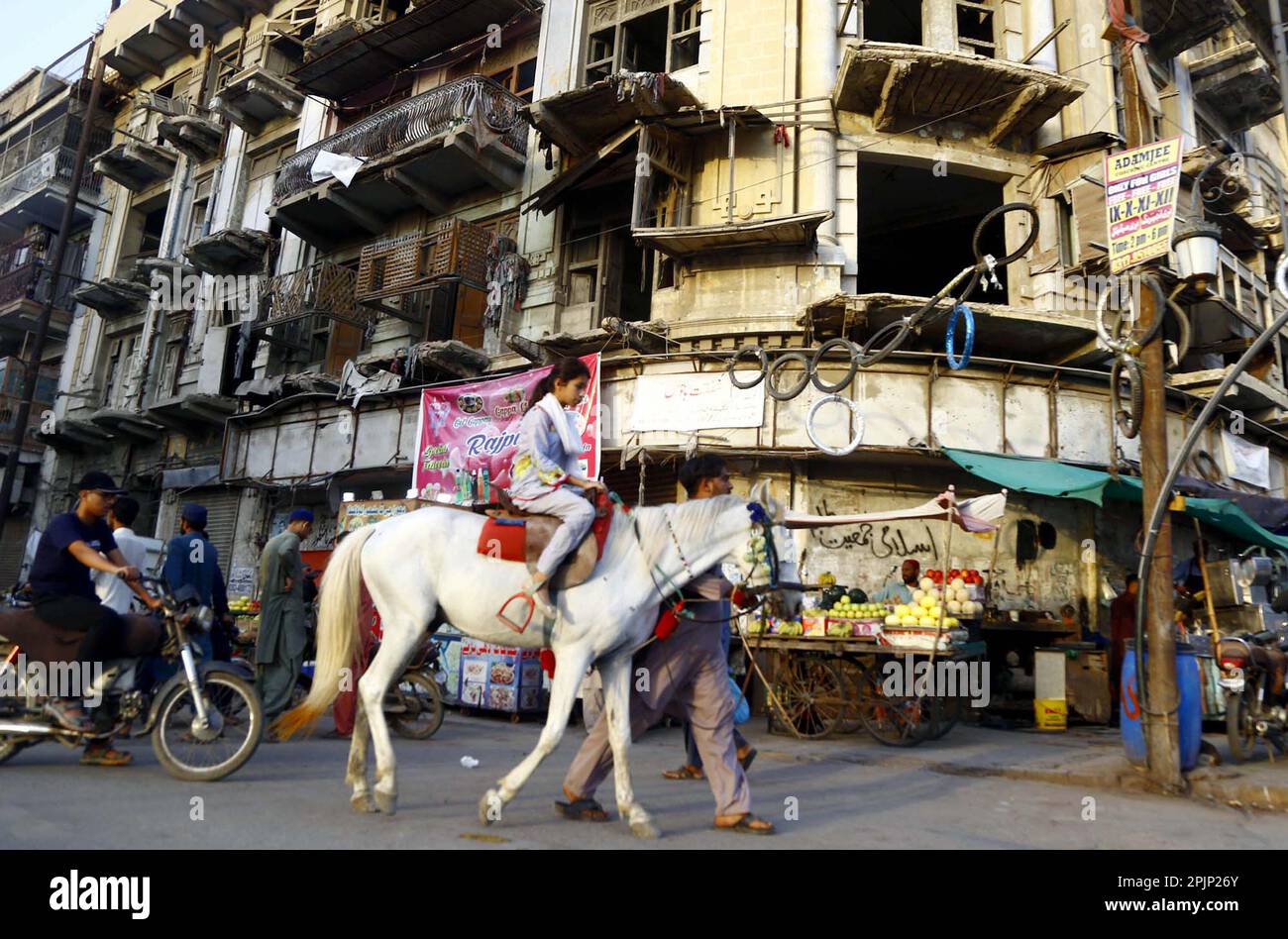 Karachi, Pakistan, April 3, 2023. Children are enjoying horse riding at