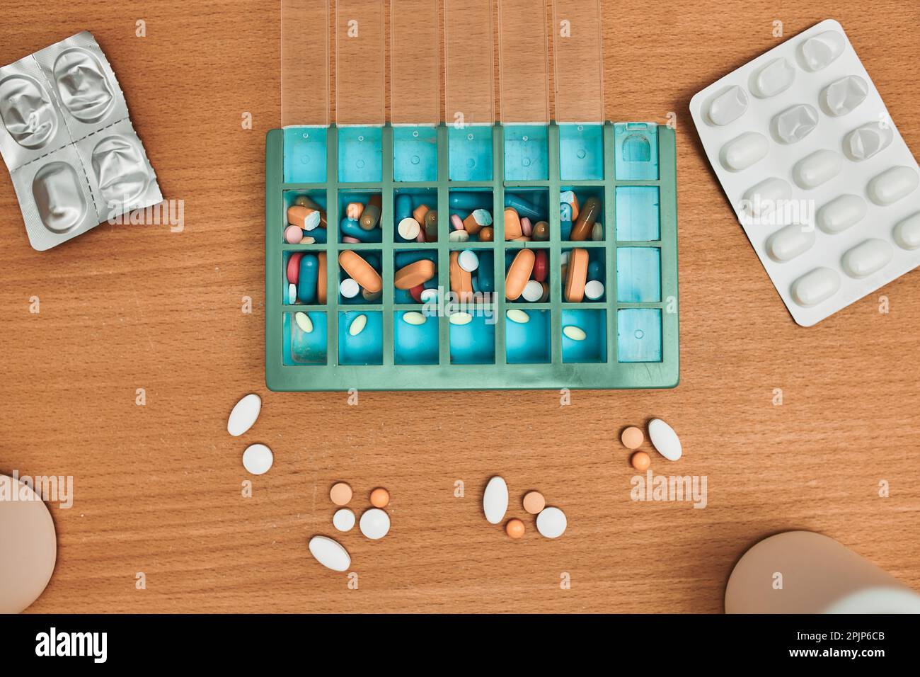 Pill dispenser. Healthcare and old age concept with medicines