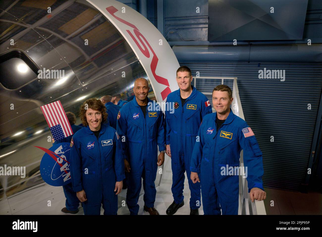 The crew of Artemis II (left to right): NASA astronauts Christina Hammock Koch, Victor Glover, Canadian Space Agency astronaut Jeremy Hansen, and NASA astronaut Reid Wiseman, pose with the Orion simulator. NASA and the Canadian Space Agency (CSA) announced the four astronauts who will venture around the Moon on Artemis II, the first crewed mission on NASA's path to establishing a long-term presence on the Moon, during an event on Monday, April 3, 2023, at Ellington Field near NASA's Johnson Space Center in Houston. NASA Photo by James Blair/UPI Stock Photo