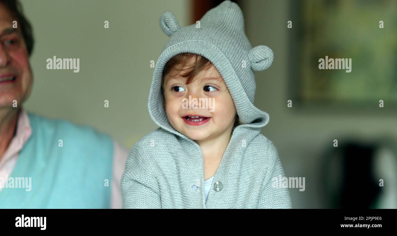 Cute baby wearing hoodie. Portrait adorable infant child toddler boy Stock Photo Alamy