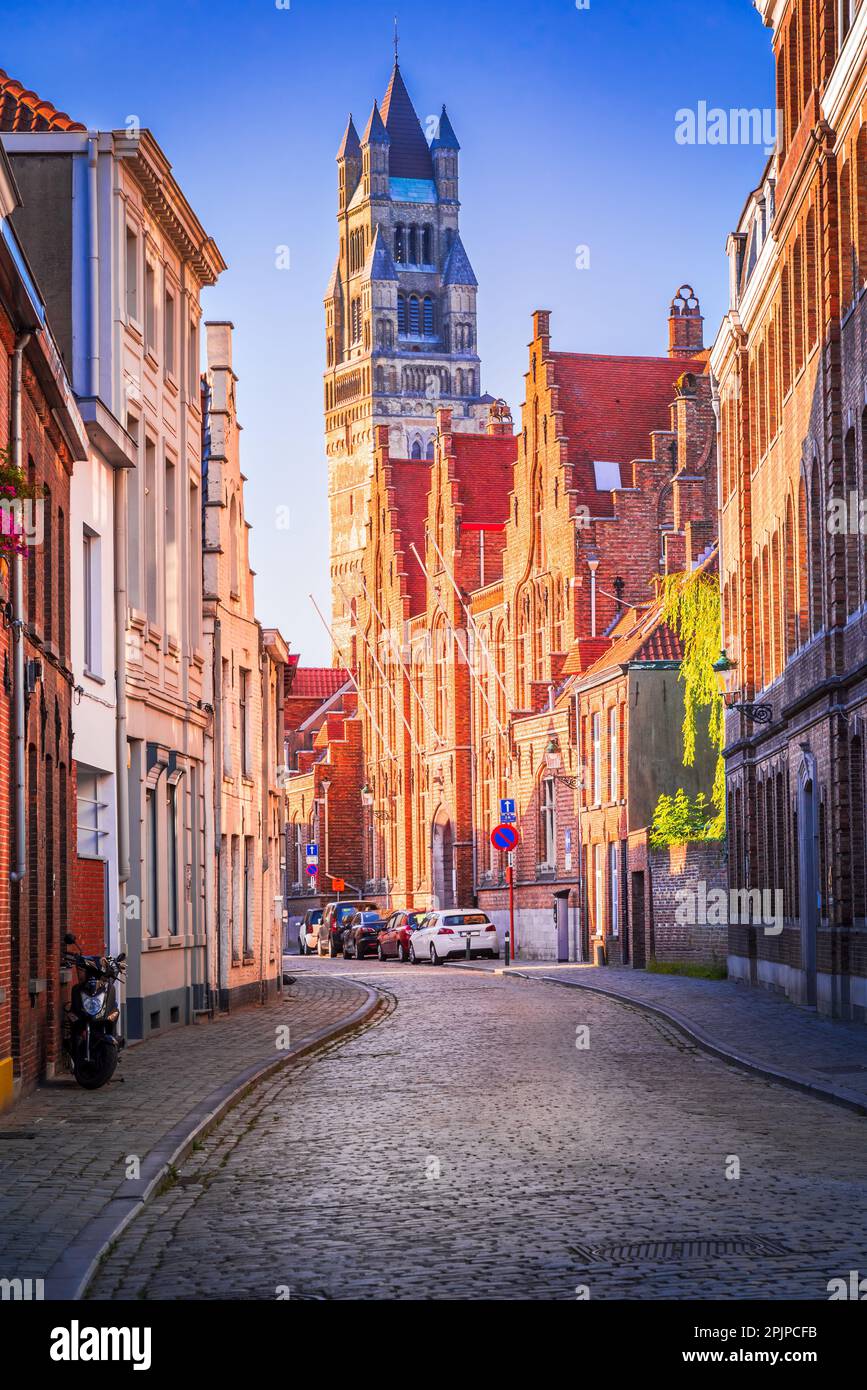 Bruges, Belgium. Sint-Salvatorskathedraal in Brugge is a Gothic-style cathedral with a tall bell tower, beautiful stained glass windows, and impressiv Stock Photo