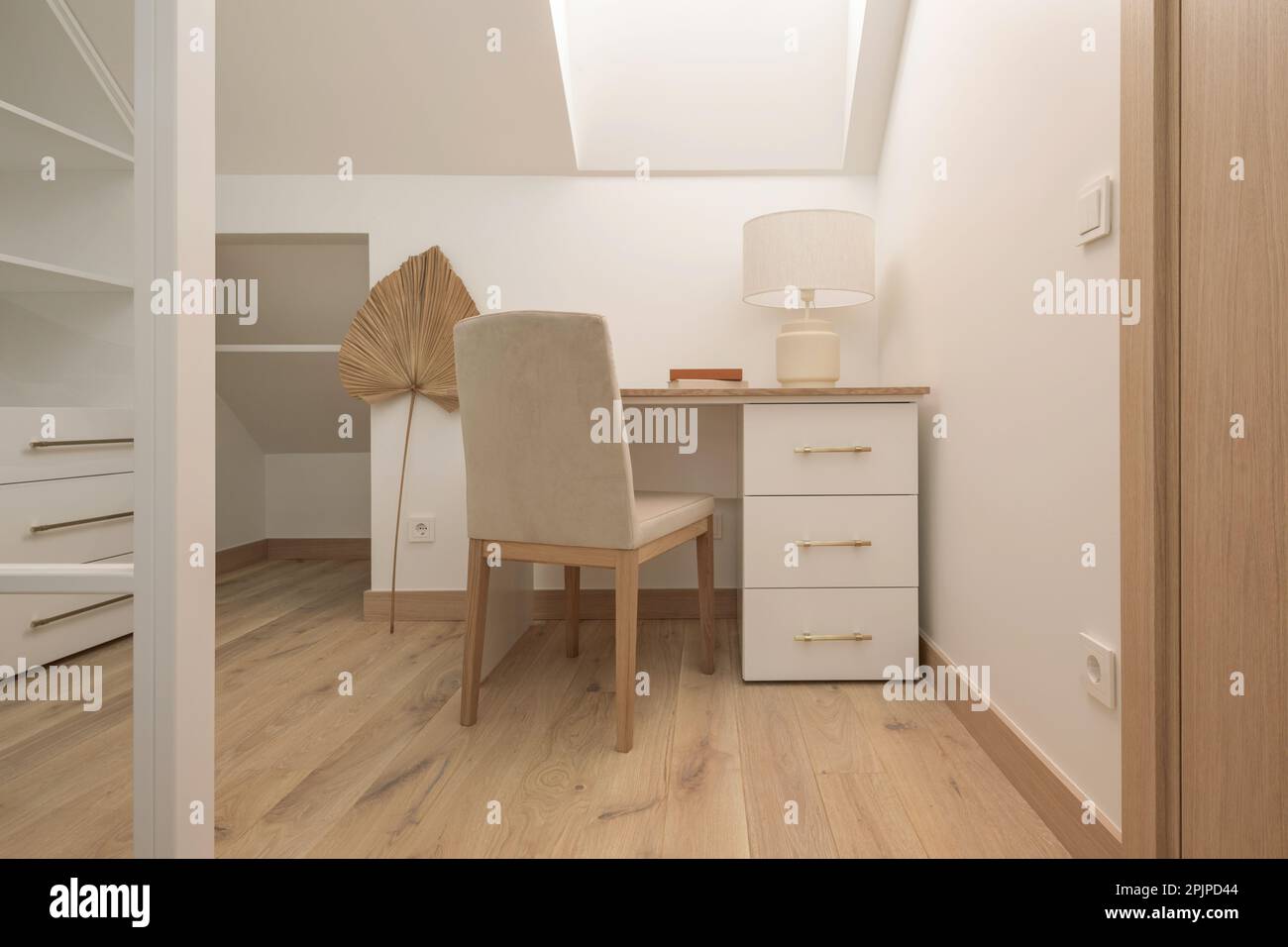 A cozy Home interior in warm beige tones in Japanese  and Scandinavian Style. Modern Scandinavian wardrobe Interior Design. Japandi Concept Stock Photo
