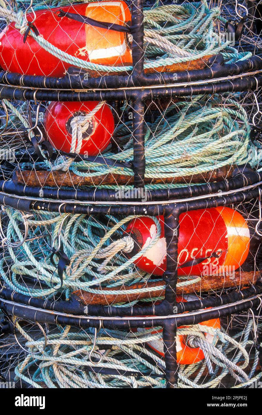 Colorful crab pots sitting on a dock in Crescent City, California Stock