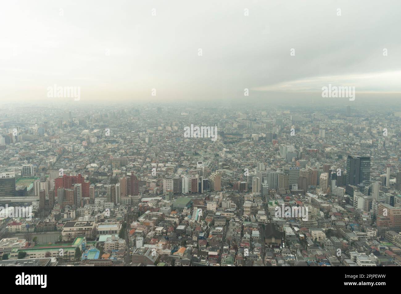 Tokyo, through the smog of an inversion, January 2012 Stock Photo
