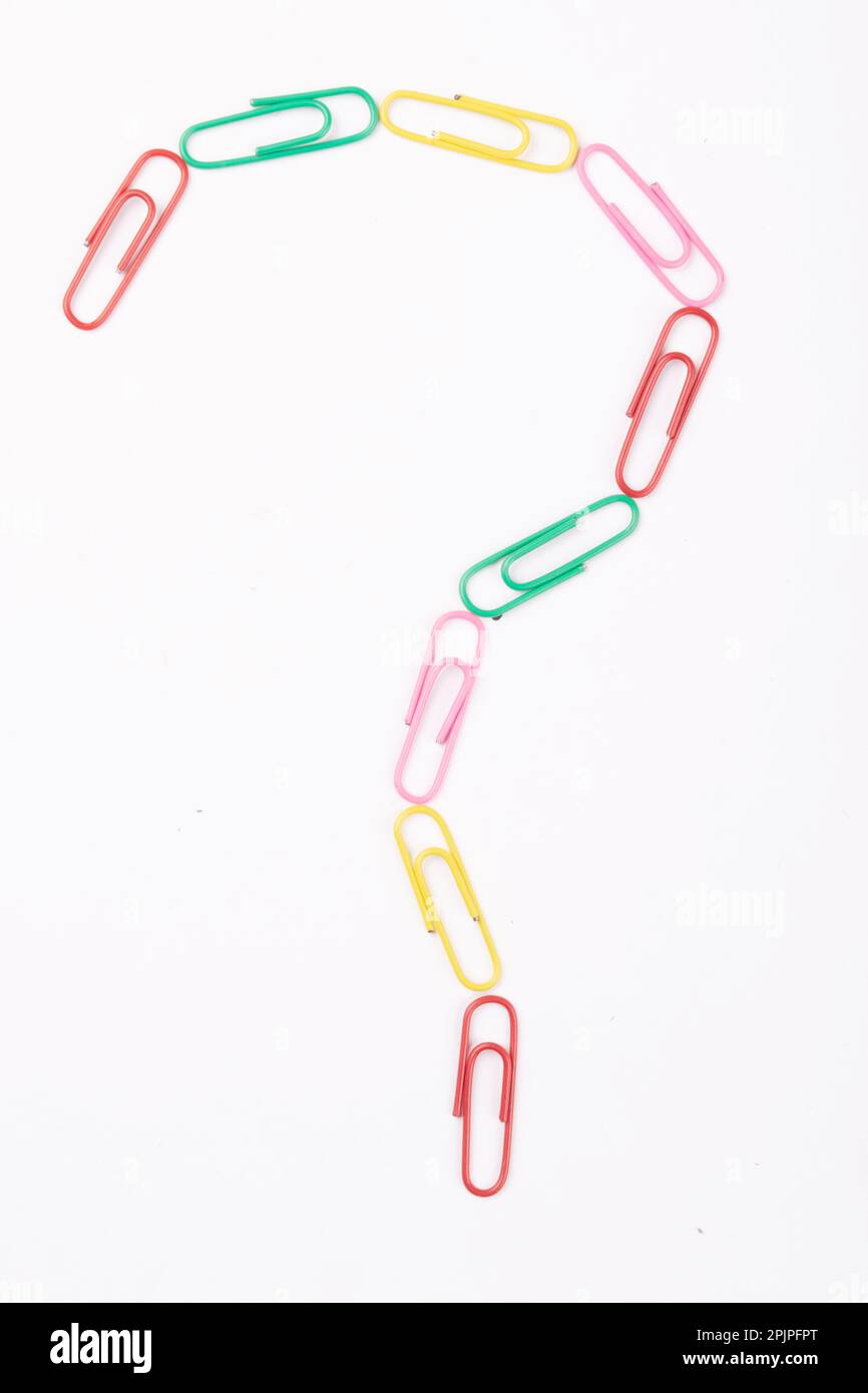 Question mark created by paperclip on white background Stock Photo Alamy