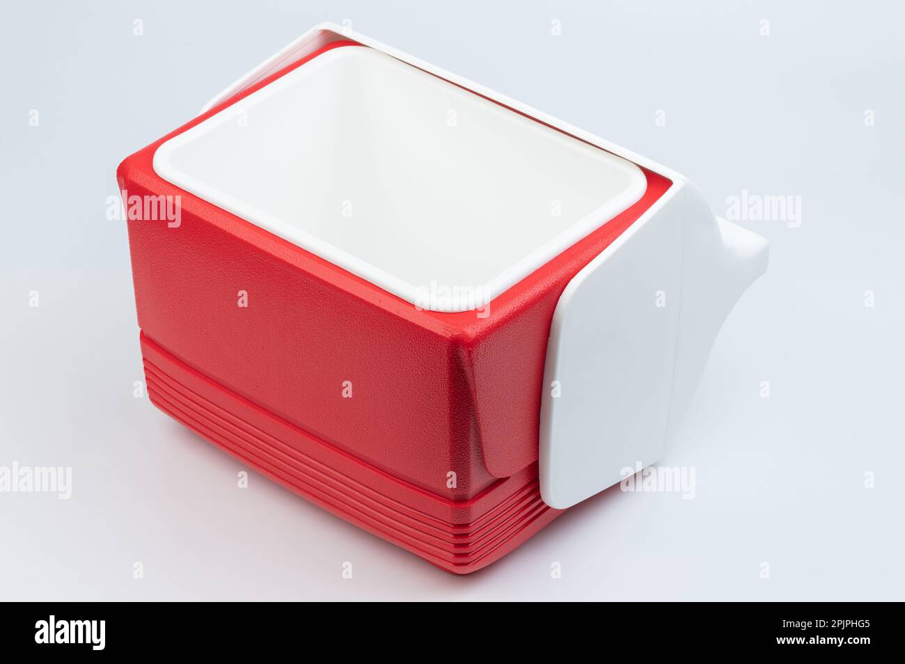 Red open plastic lunch box isolated on white studio background Stock Photo