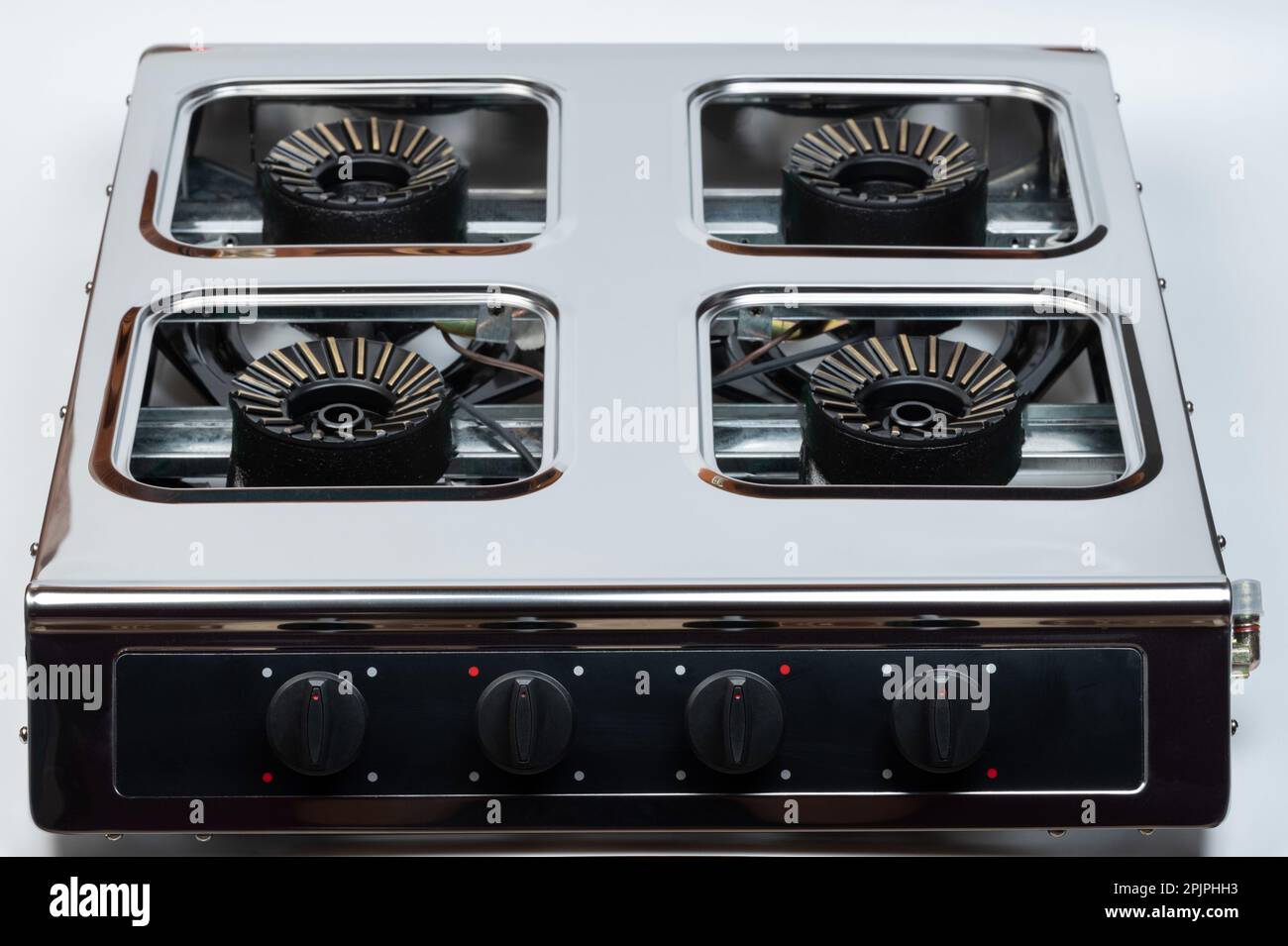 Metal new gas stove with 4 parts isolated on white studio background