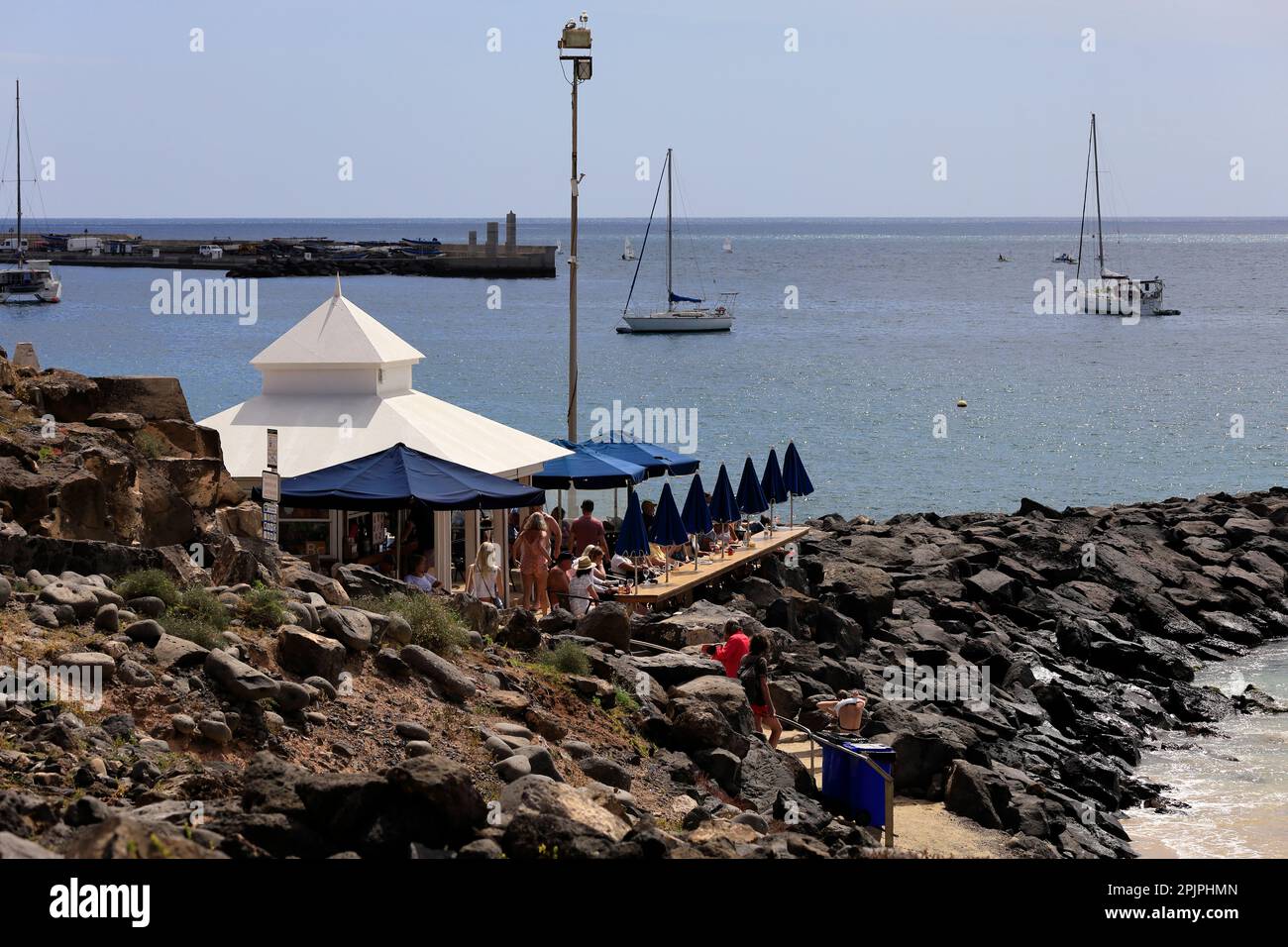 Bar on the rocks, Playa Blanca beach, Lanzarote. February 2023. Stock Photo