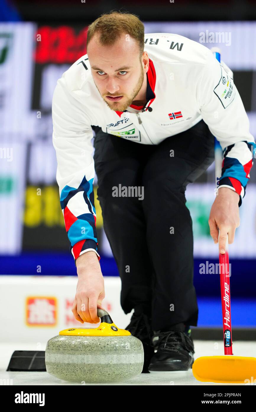 Norwegian skip Magnus Ramsfjell throws as they take on New Zealand at