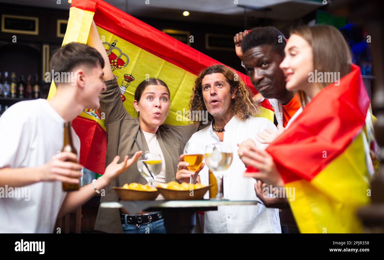 Spain sports fans supporting their favourite team in pub Stock Photo