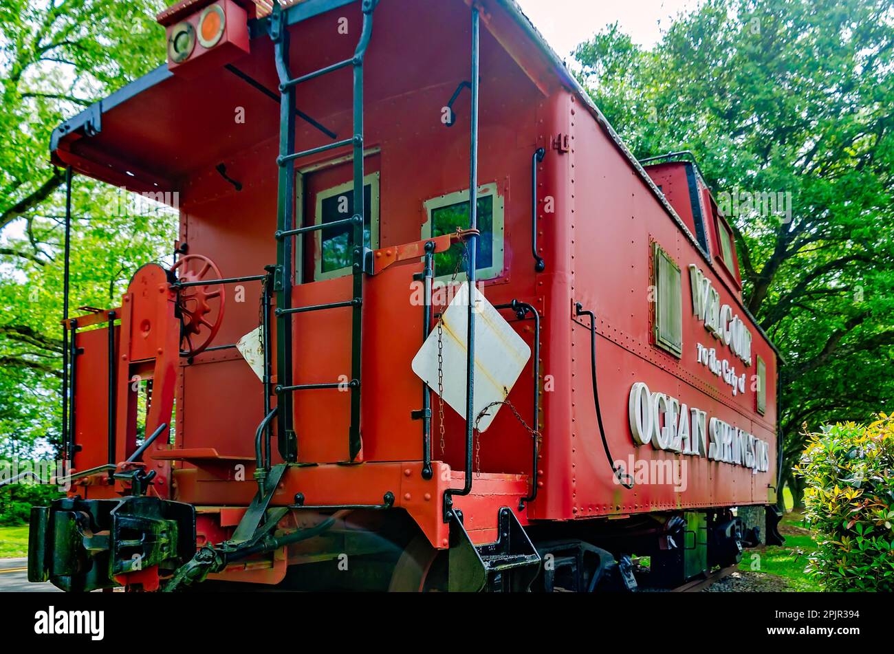 A red caboose on Highway 90 welcomes visitors to the City of Ocean Springs, April 2, 2023, in Ocean Springs, Mississippi. Stock Photo