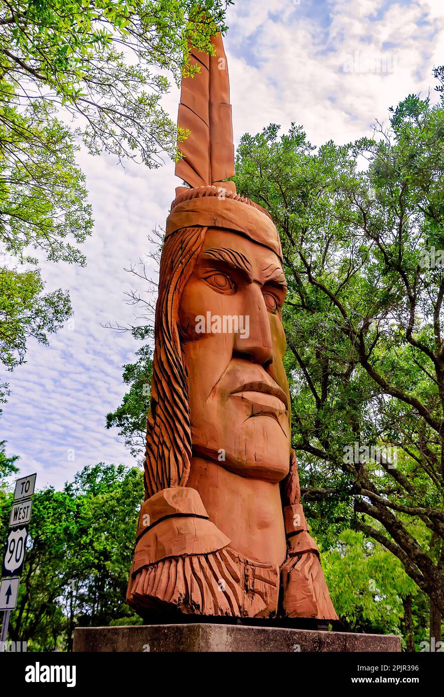 Crooked Feather, a 30-foot Indian sculpture, is displayed on Highway 90, April 2, 2023, in Ocean Springs, Mississippi. Stock Photo