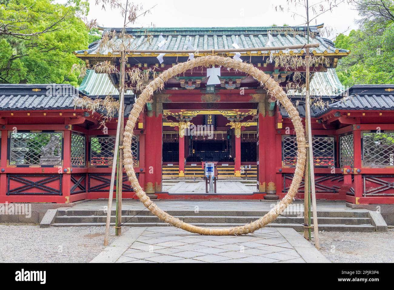 Shrine Rope Circle of sacred rope, or shimenawa, at the entrance to Nezu Shrine ...