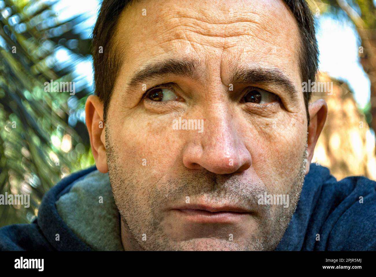 A man paying attention to a certain situation. Stock Photo