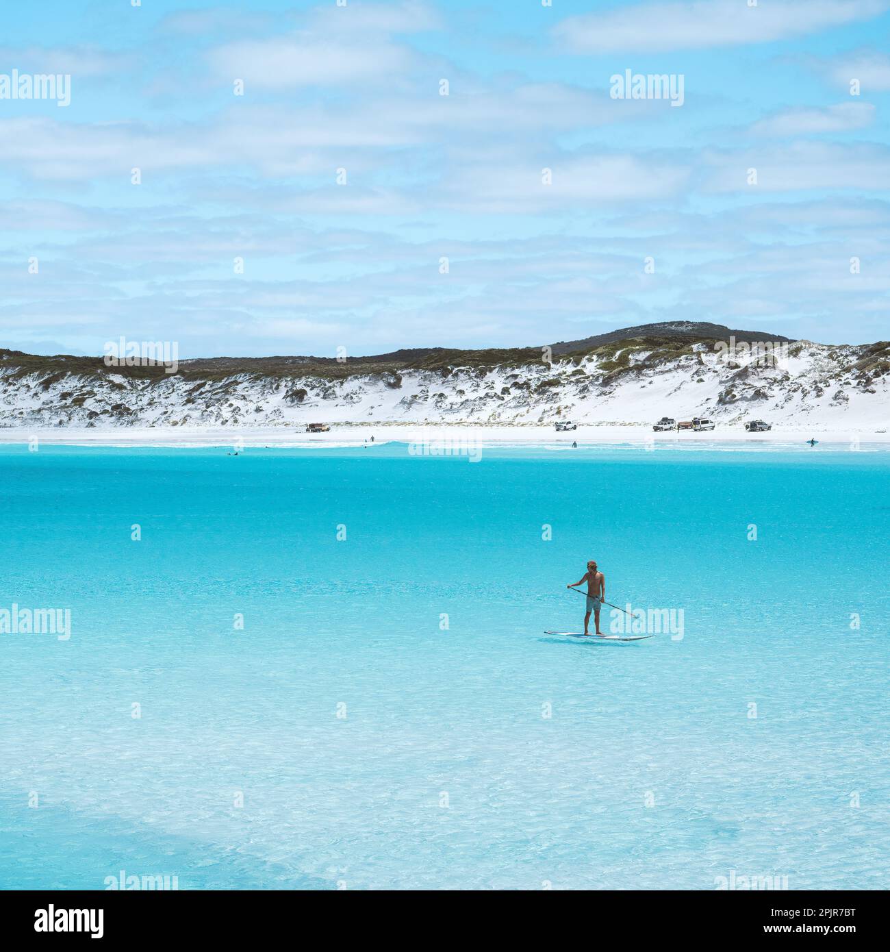 Wharton Beach, Western Australia Jan 8 2023 Paddle boarder standing