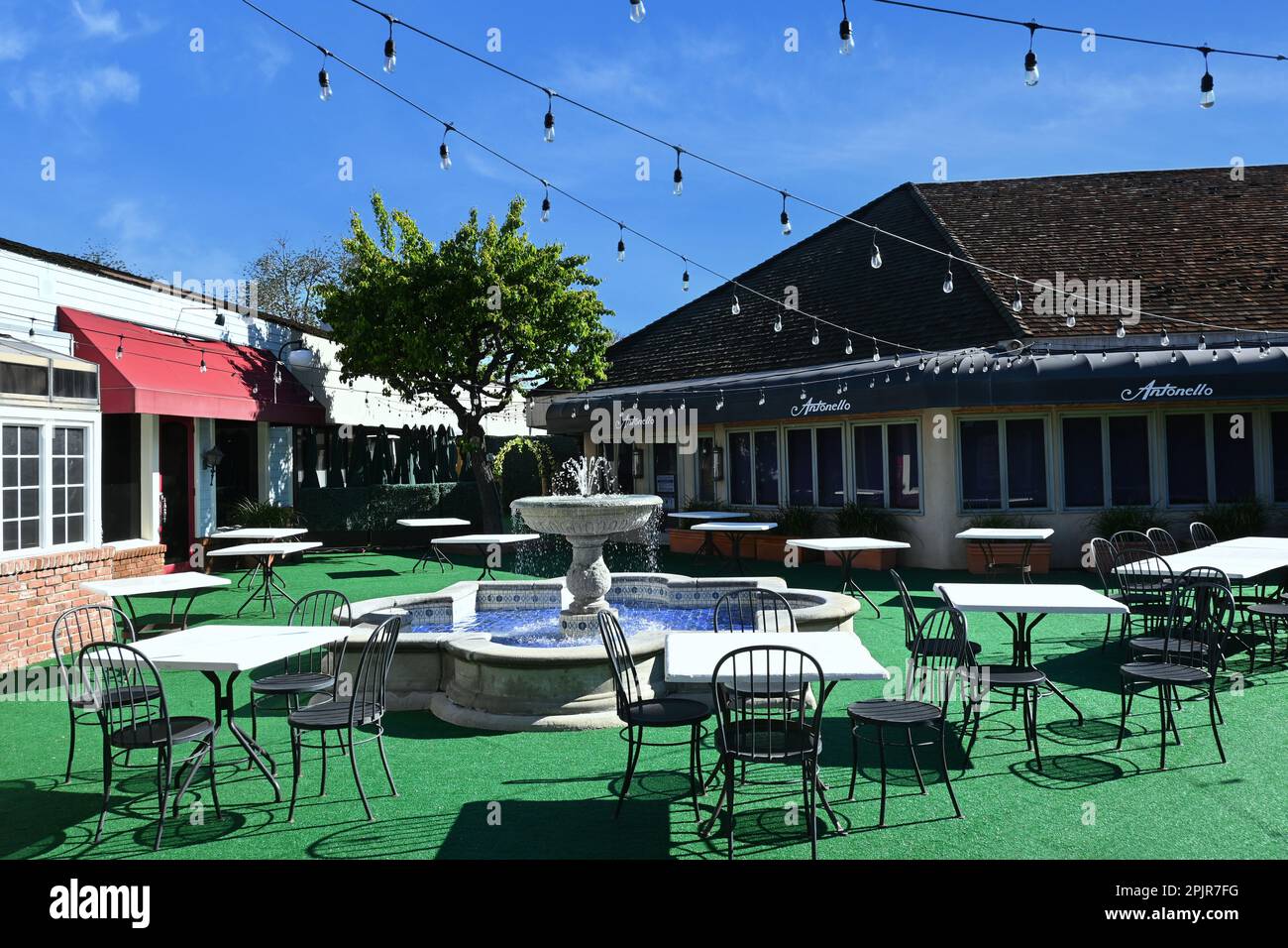 SANTA ANA, CALIFORNIA - 31 MAR 2023: Outdoor Dining area for Antonello Ristorante in South Coast Village. Stock Photo