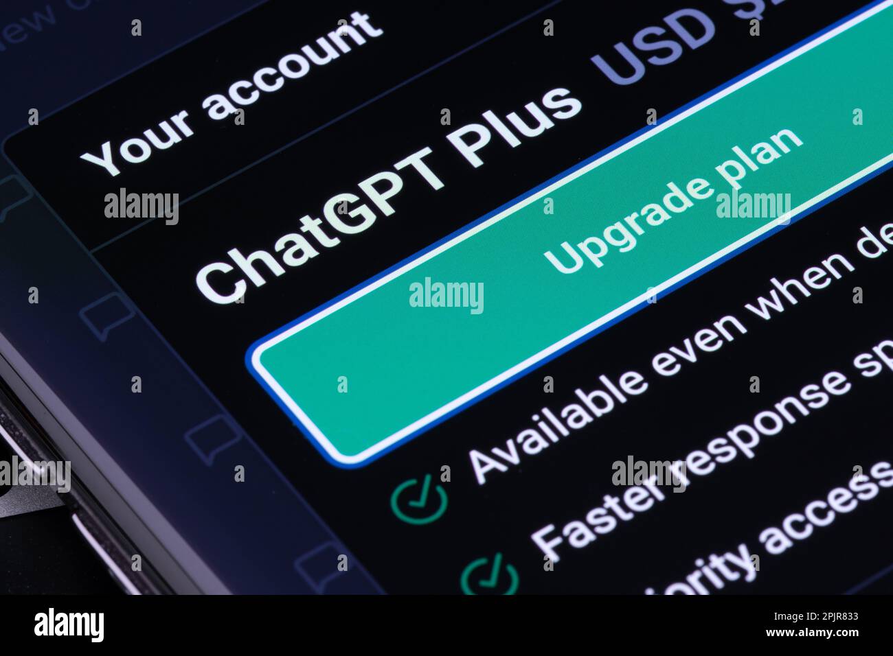 ChatGPT Plus option of AI Chat GPT seen on smartphone placed on laptop ...
