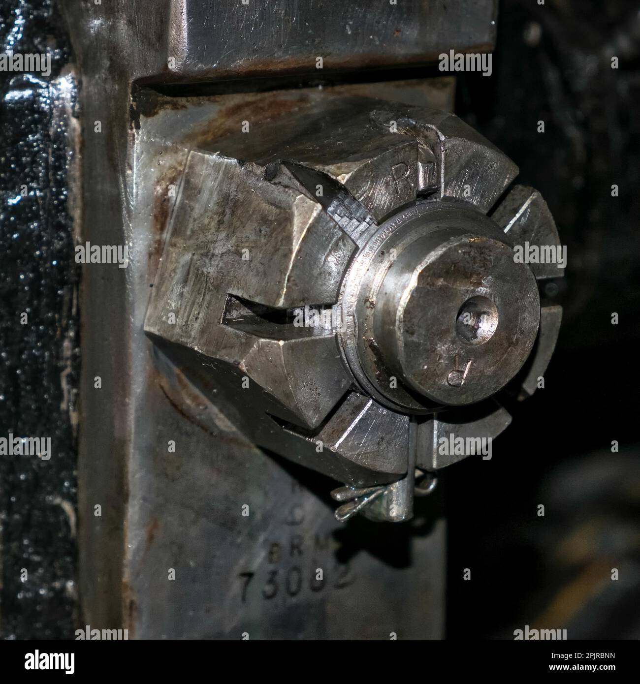 Steel nut on an old steam train Stock Photo