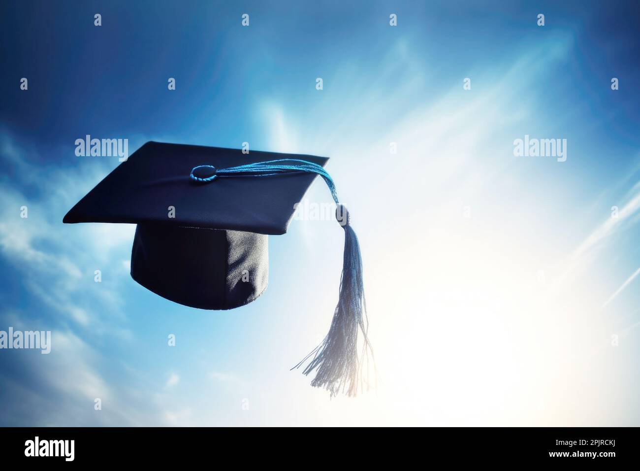 Graduation cap thrown into the blue sky. Graduation from an educational
