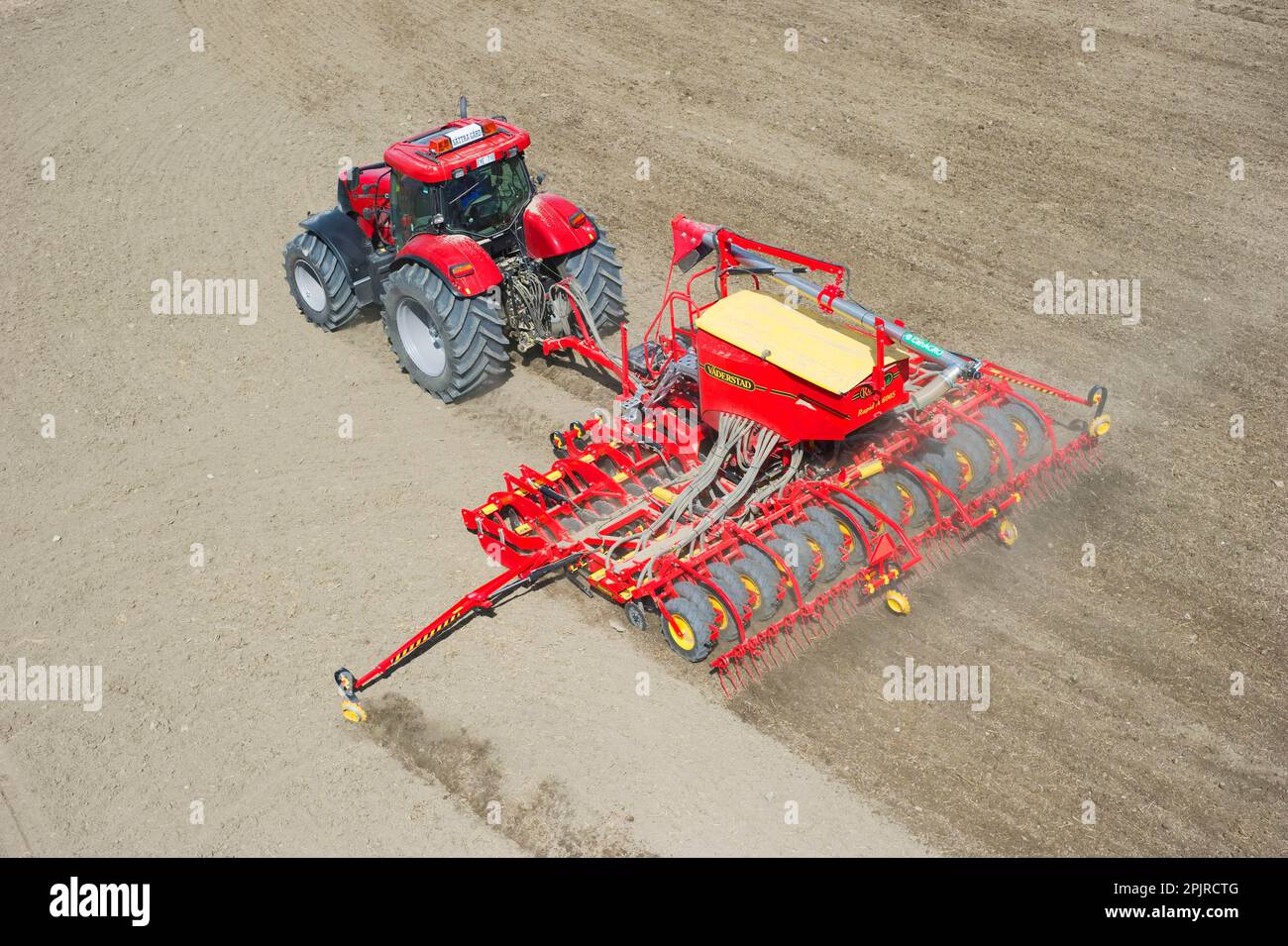 Case 225 Tractor CVX with seed drill Vaderstad Rapid A 600S, seed drill for arable farming, Upplands Vasby, Sweden Stock Photo